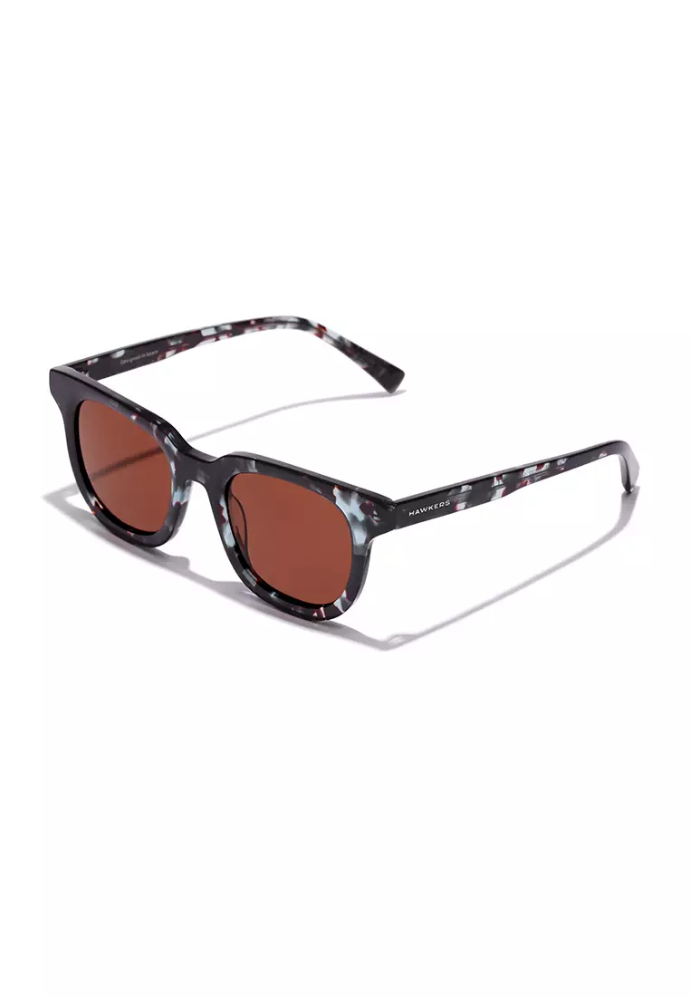 HAWKERS Blue Carey Brown Oasis Sunglasses For Men And Women, Unisex. Official Product Designed In Spain
