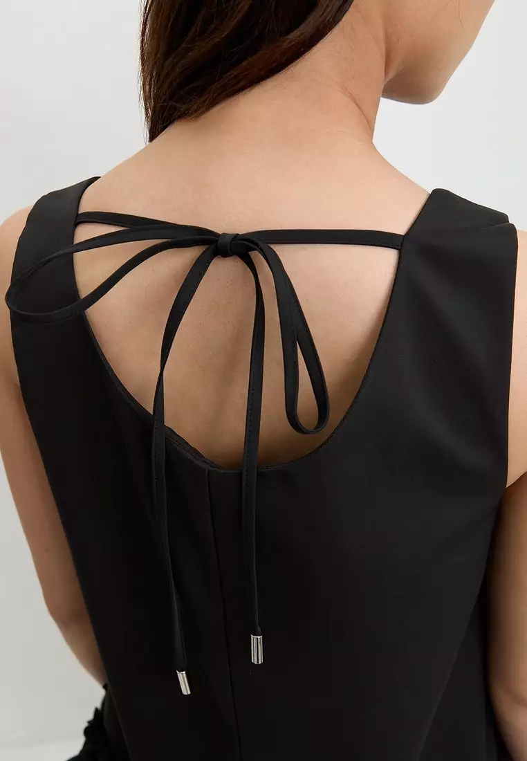 Buy Pomelo Sleeveless Drop Waist Ruffle Hem Mini Dress - Black 2026 Online  | ZALORA
