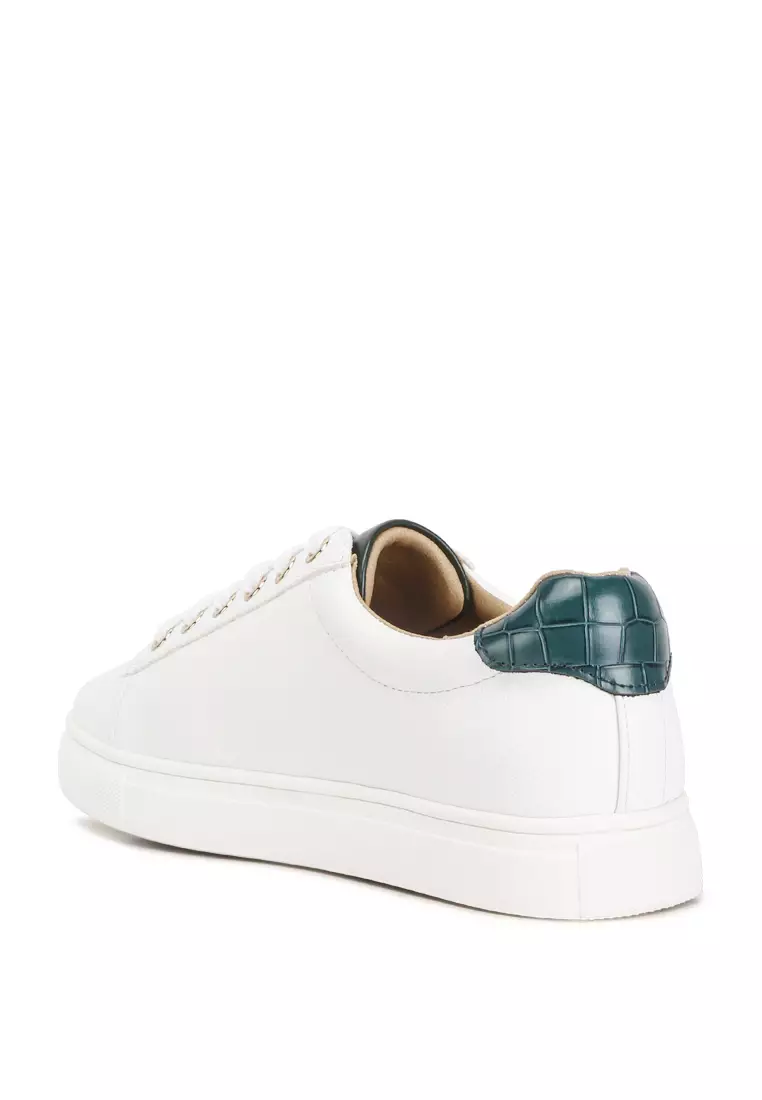 White sneakers with green back sale