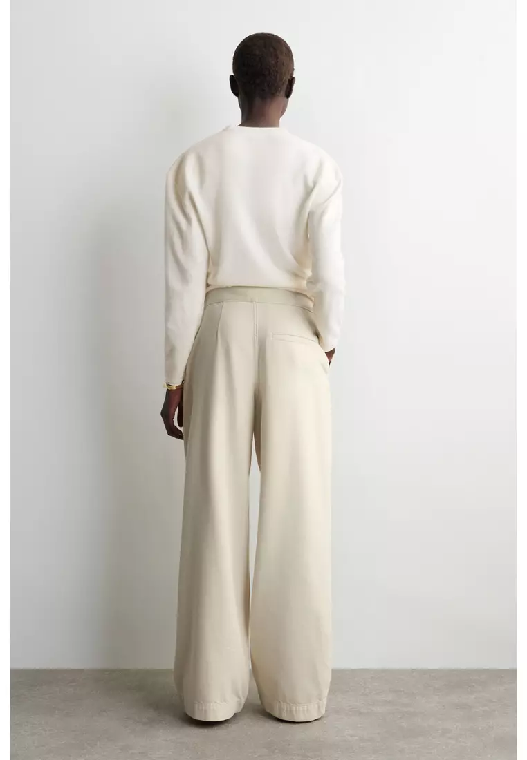 PLEATED WIDE-LEG DENIM TROUSERS