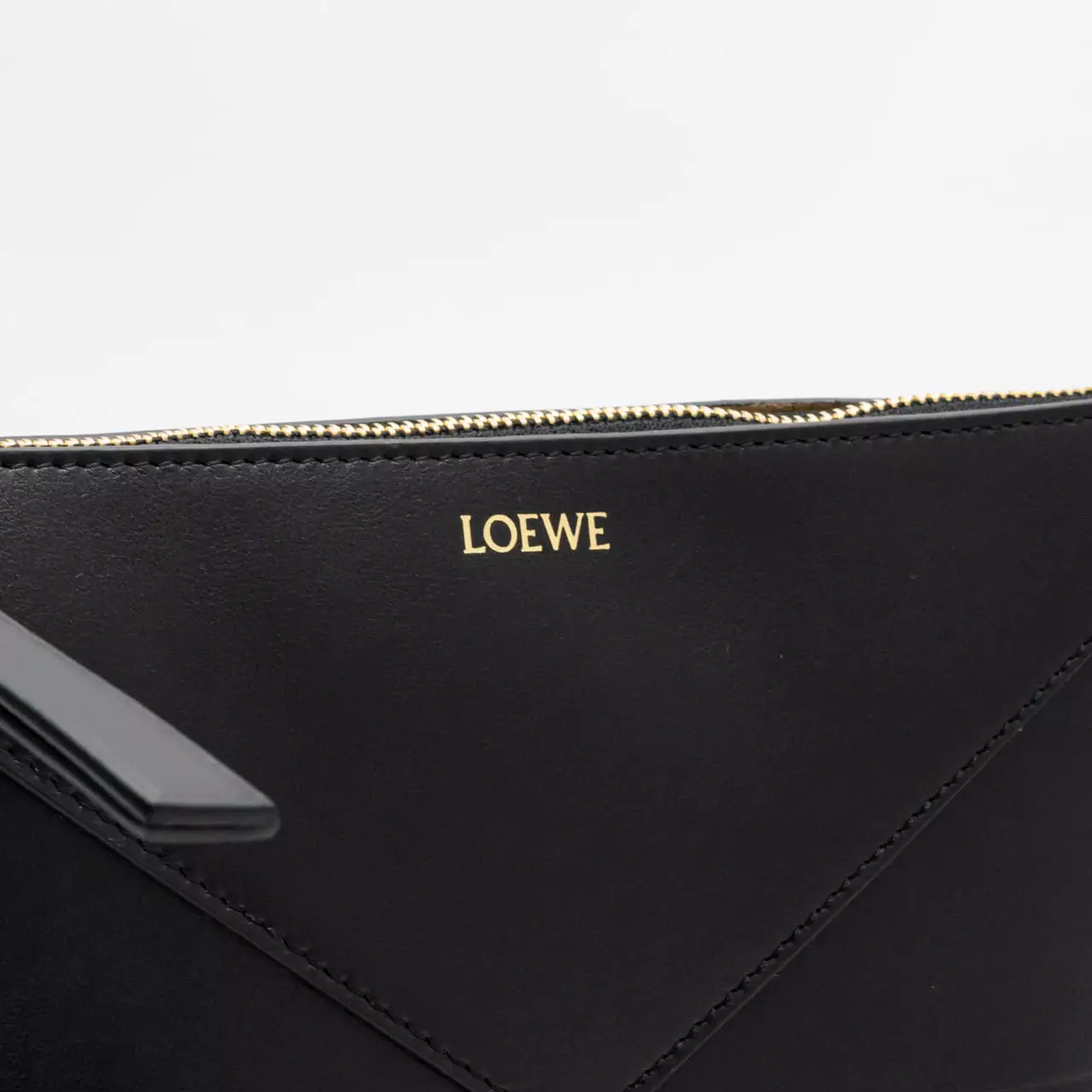 Puzzle Fold in Shiny Nappa Calfskin Pouch Black