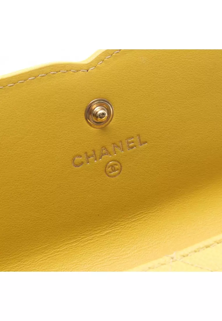 Pre-Loved Chanel CC filigree Bi-fold Long Wallet Caviar skin leather yellow gold hardware