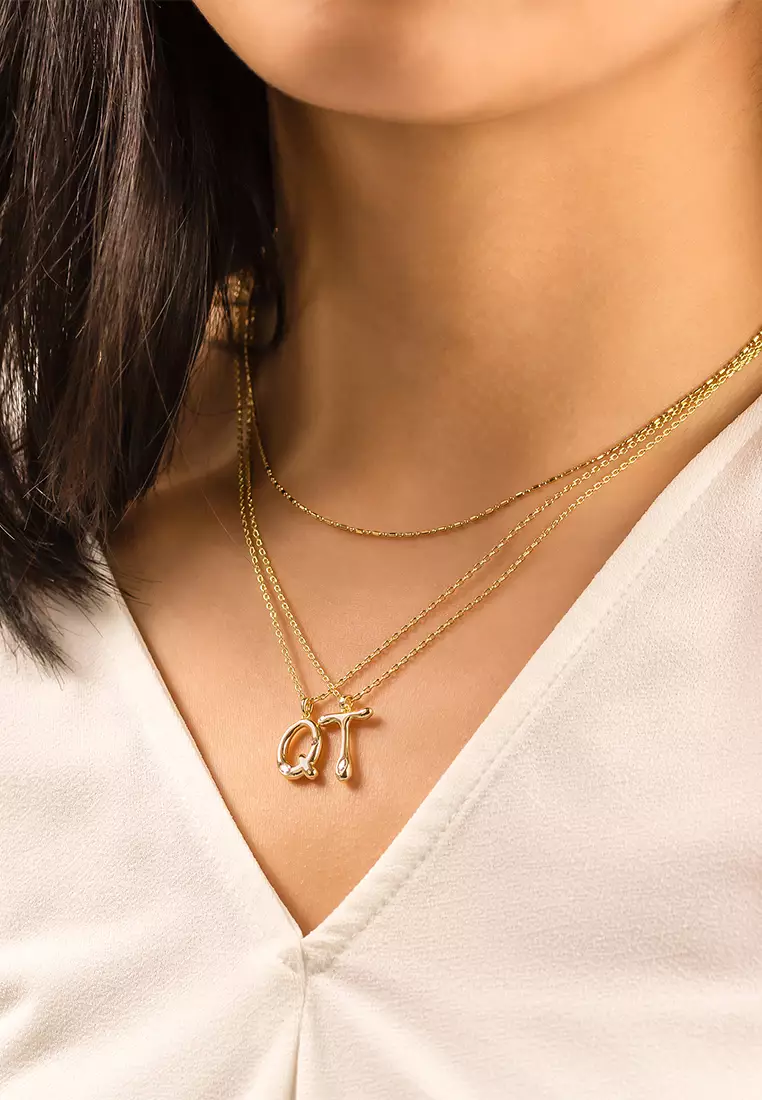 Gold necklace with on sale letter a pendant