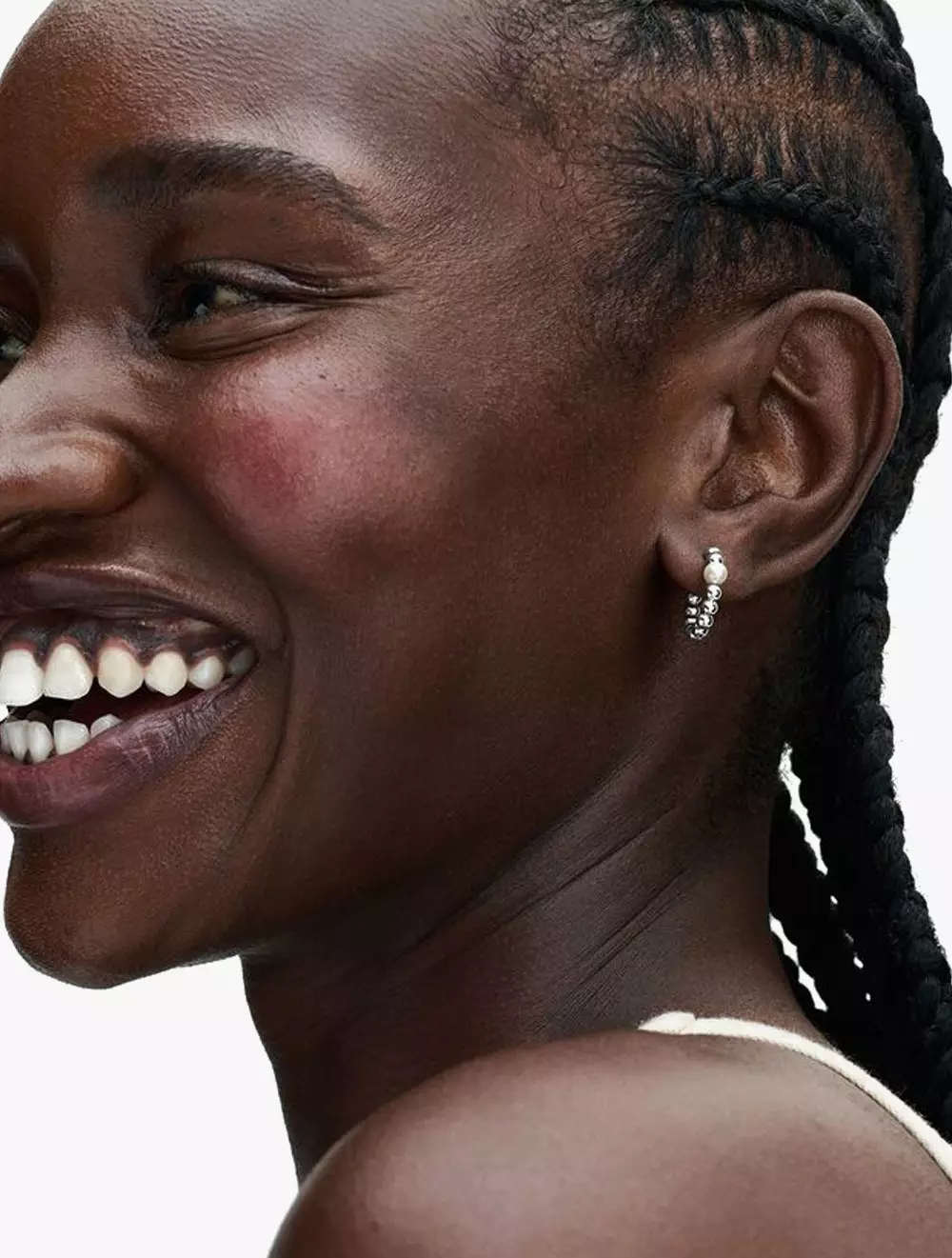 Sterling silver hoop earrings with white treated freshwater cultured pearl