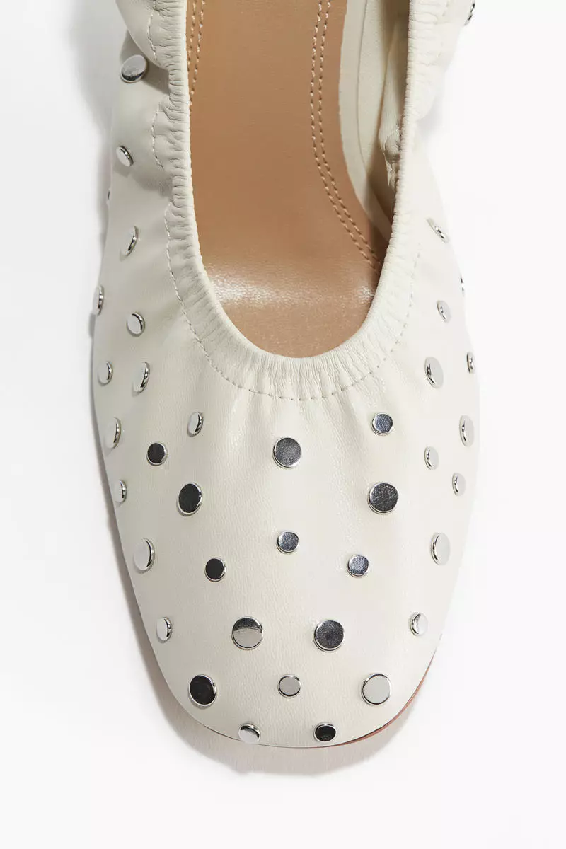 Studded ballet-style court shoes