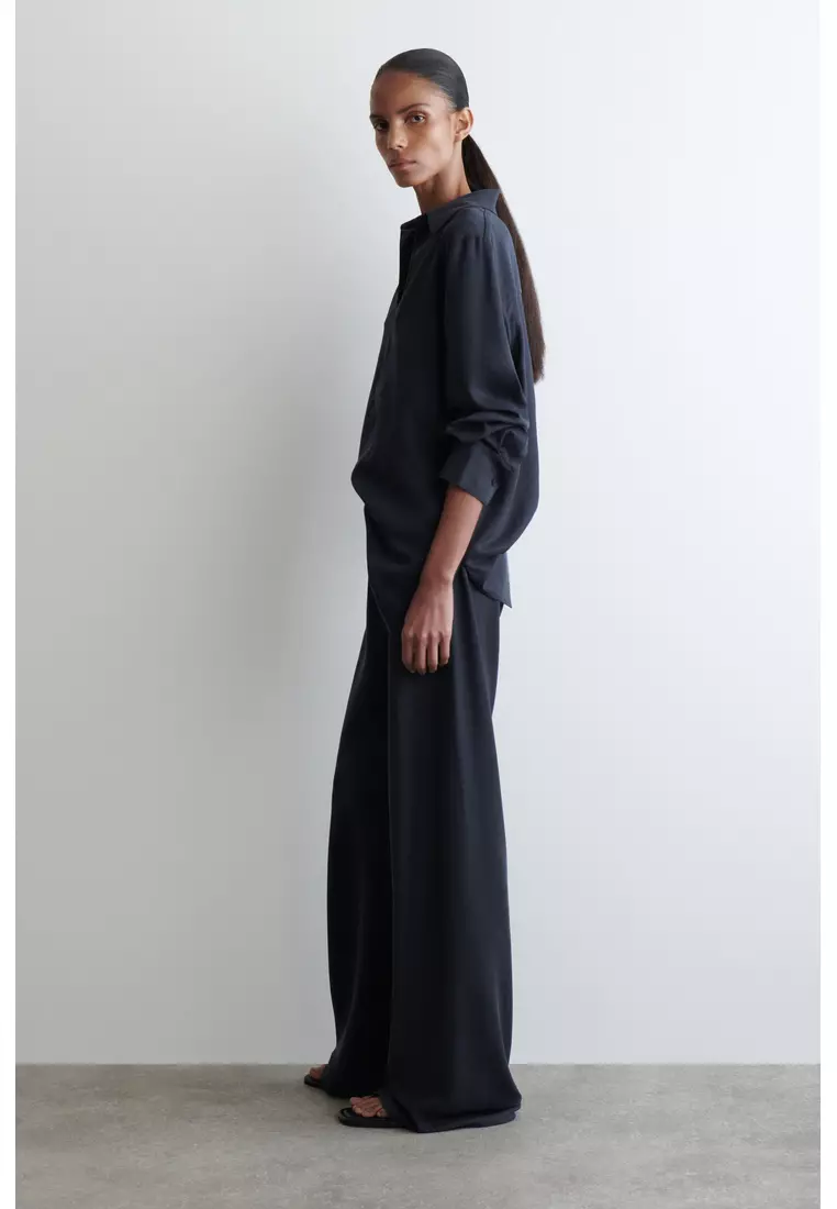 ELASTICATED WIDE-LEG TROUSERS