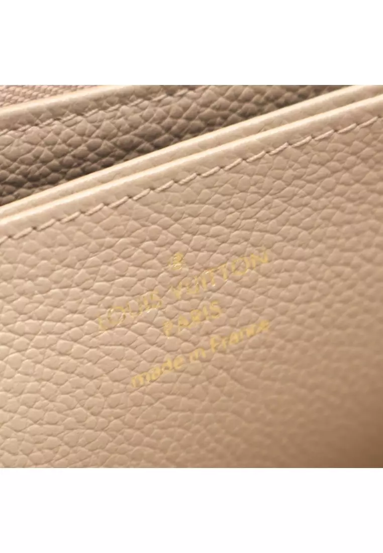 Pre-Loved Louis Vuitton zippy wallet bicolor monogram Empreinte tourterelle claim round zipper long wallet leather Gray beige ivory