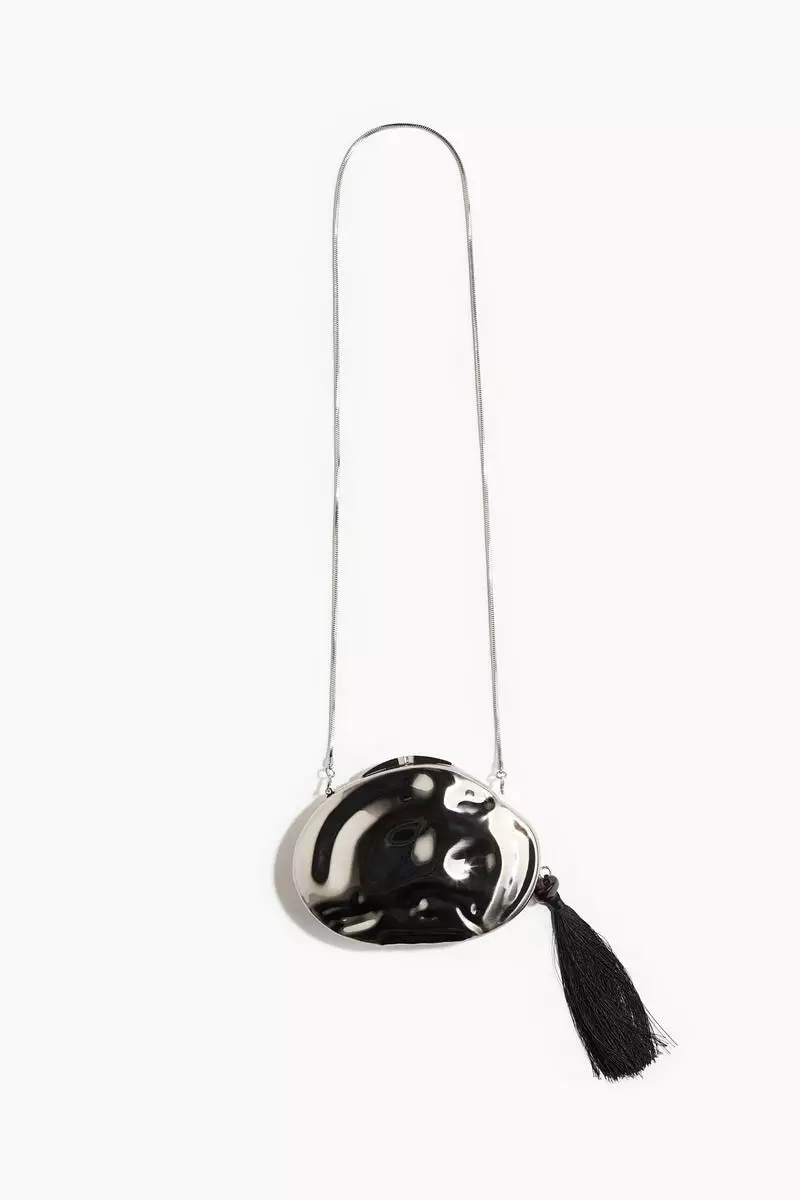 Asymmetric metal clutch