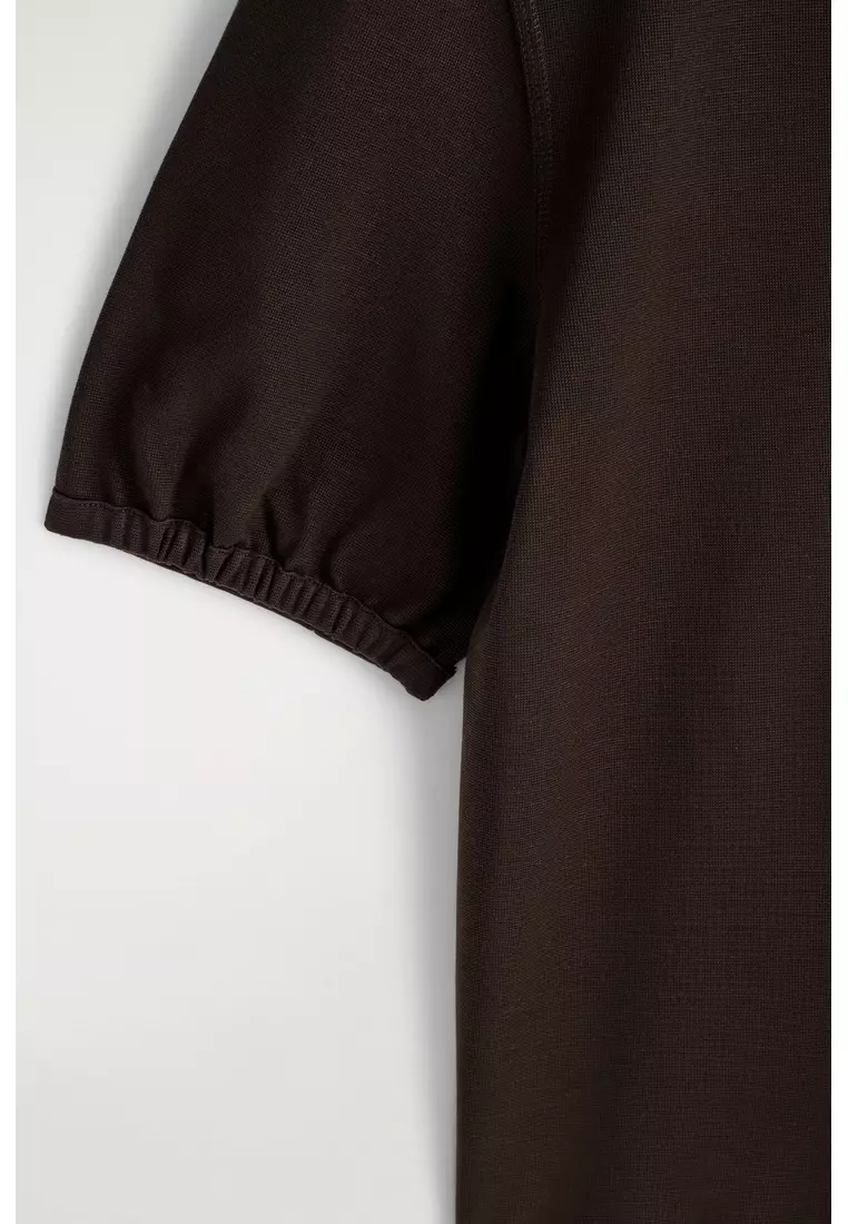GATHERED JERSEY ZIPPED POLO TOP