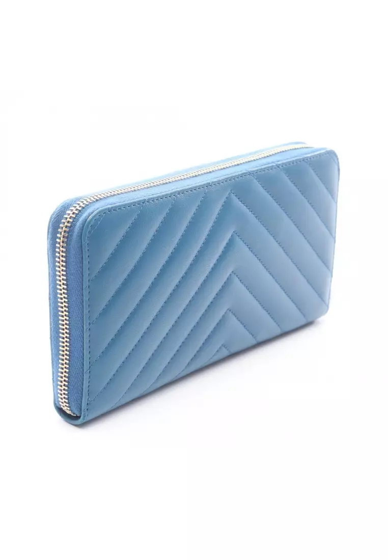 Pre-Loved Chanel Chevron V-stitch round zipper long wallet lambskin blue gold hardware