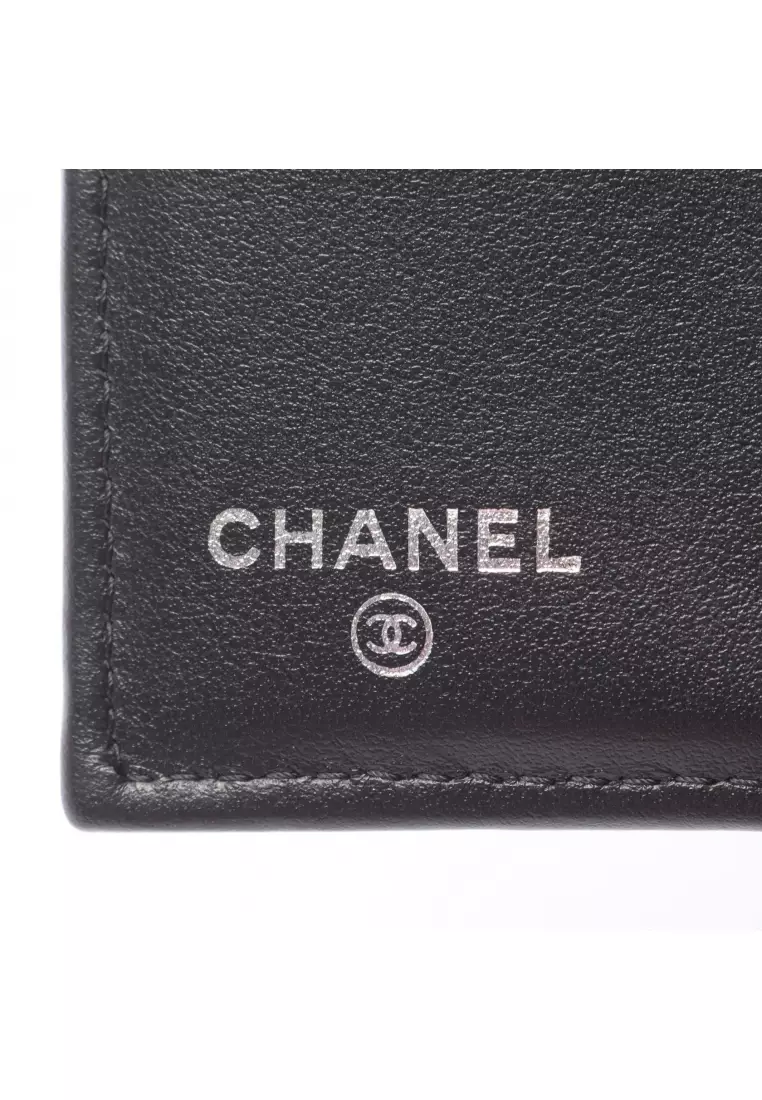 Pre-Loved Chanel matelasse Bi-fold wallet leather black silver hardware