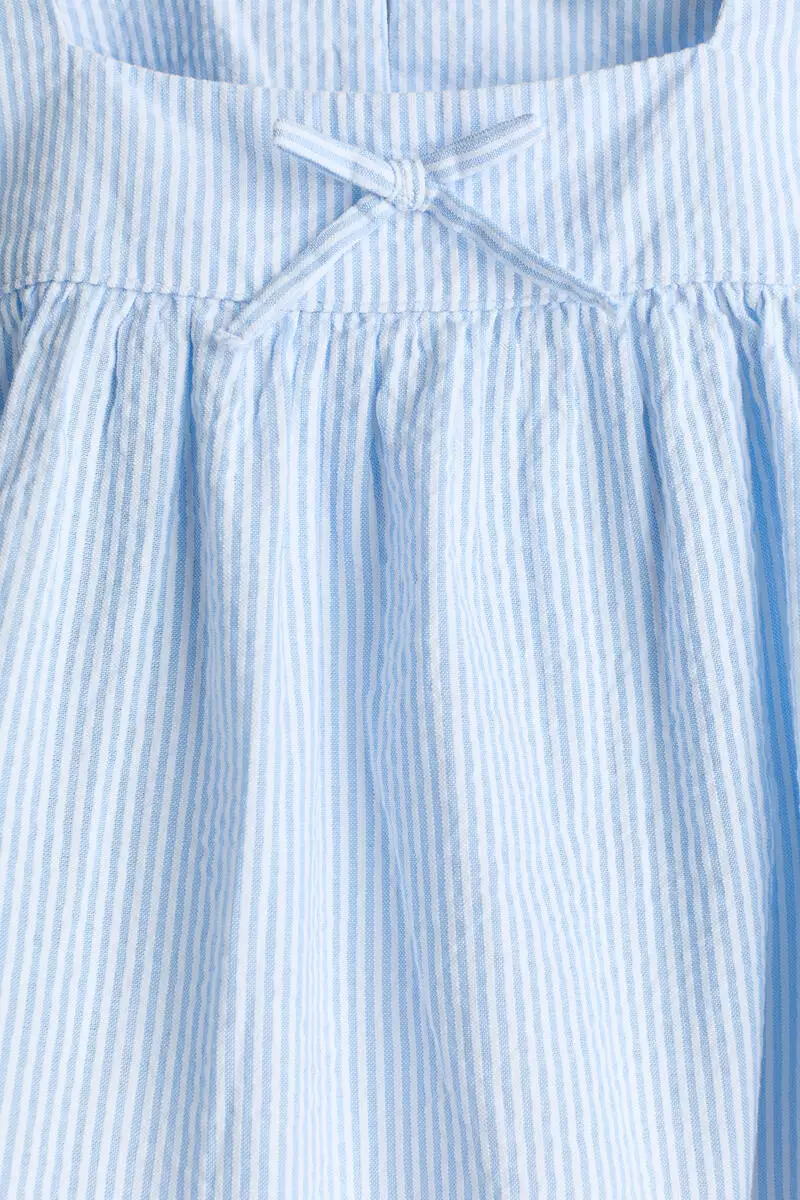 Bow-detail cotton seersucker blouse