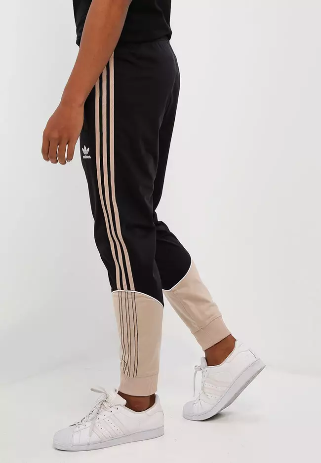 Adidas originals men's outlet tricot cuffed track pants