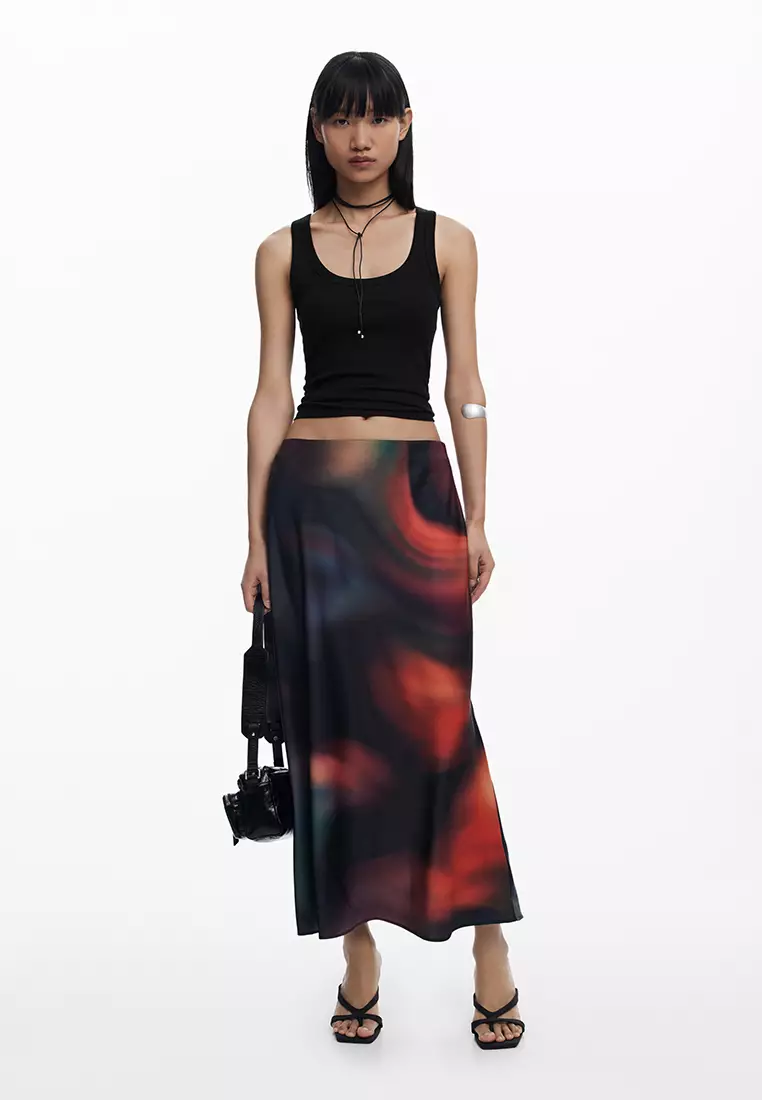 Long skirt with spots