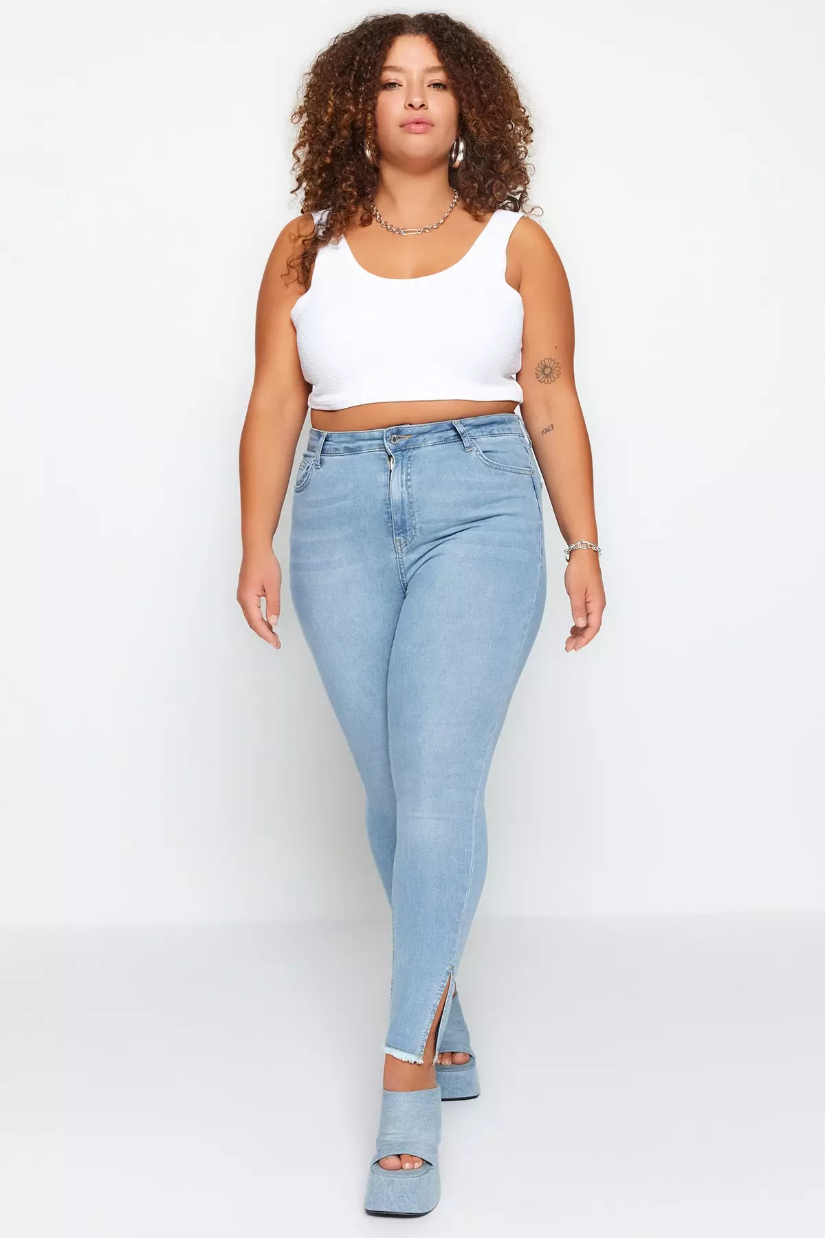 Plus Size Light Blue Elastic Skinny Denim Jeans with Slits and Tassel Detail on the legs