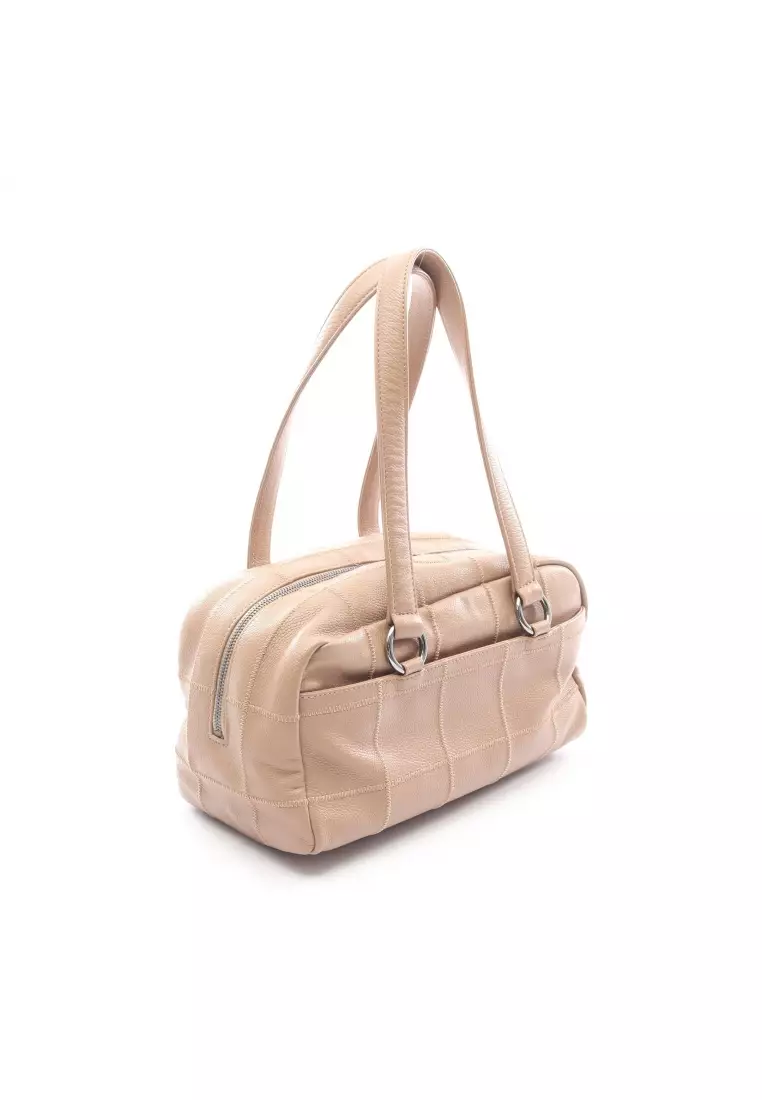 Pre-Loved Chanel chocolate bar Boston bag Caviar skin beige silver hardware