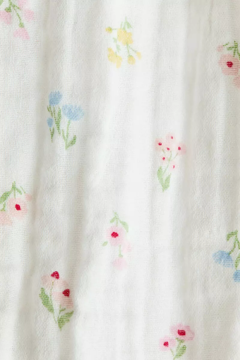 Frilled muslin romper suit