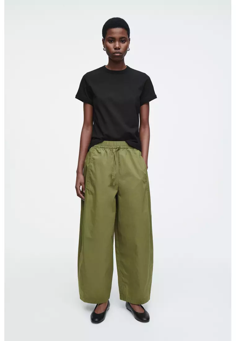 ELASTICATED BARREL-LEG TROUSERS