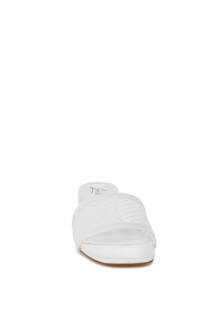 Sepatu hak rendah slip-on warna putih