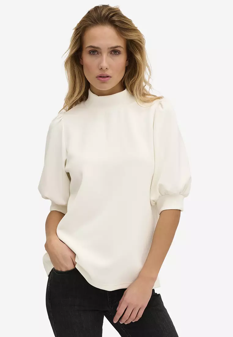 White turtleneck hotsell blouse