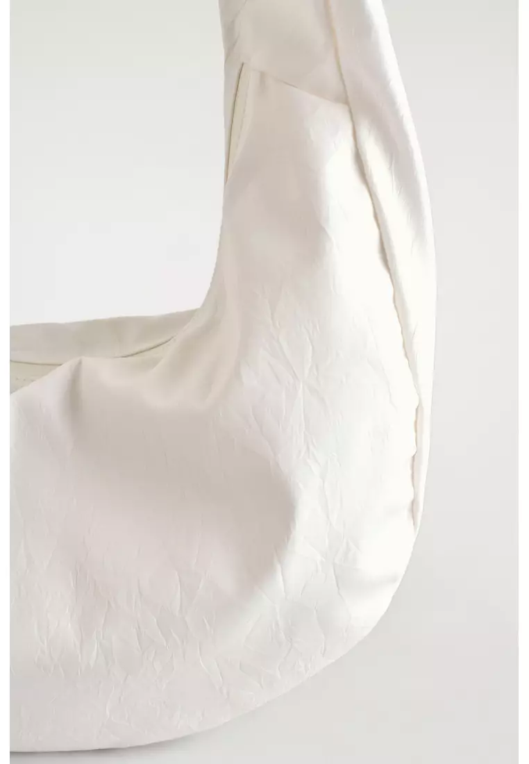 CURVED CROSSBODY BAG - CRINKLED-SHELL