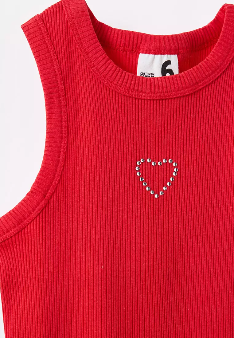 - Solid tone contrast decorative rib tank top<br>- Crew neckline<br>- Slim fit<br>- Slip on style<br>- Katun kombinasi