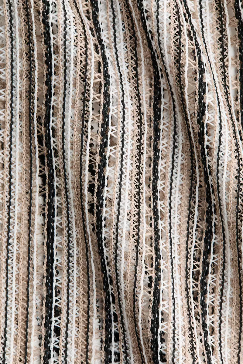 Wide hole-knit trousers