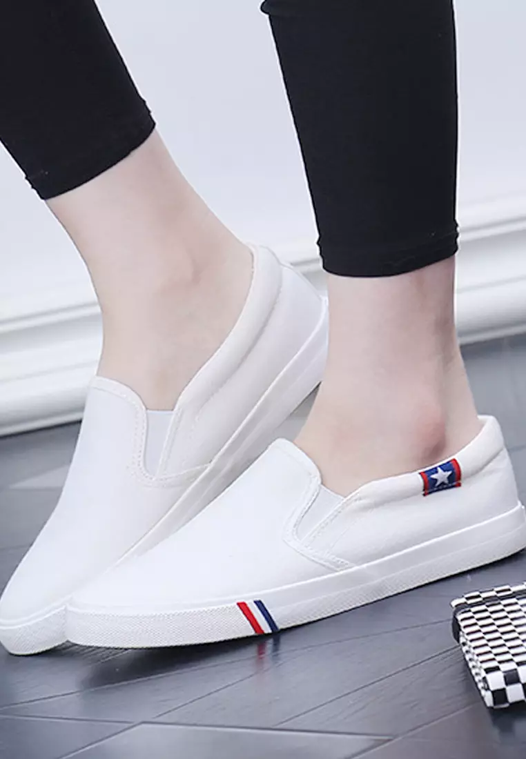 White slip on canvas sale shoes