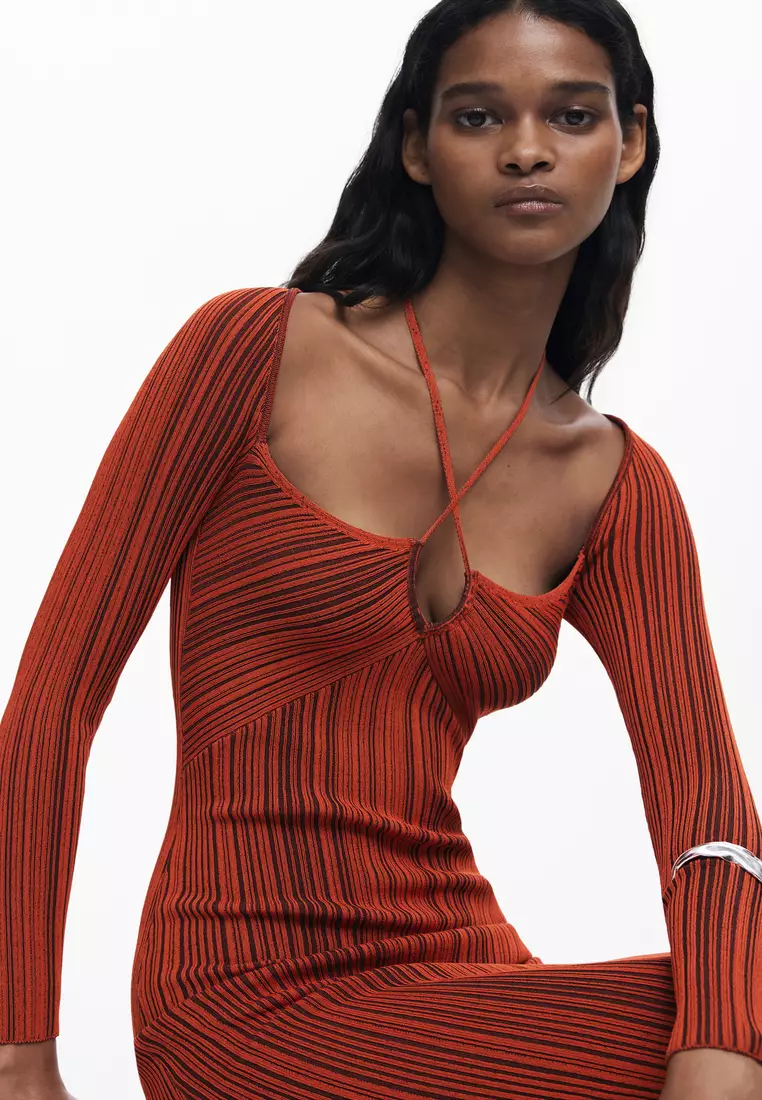 Fitted dress with a crossover neckline
