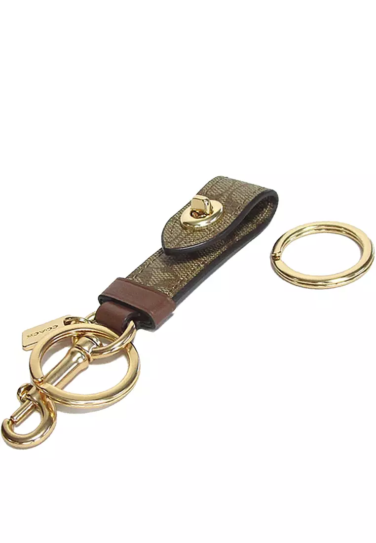 Coach Coach Trigger Snap Bag Charm In Signature Canvas in Khaki 49314