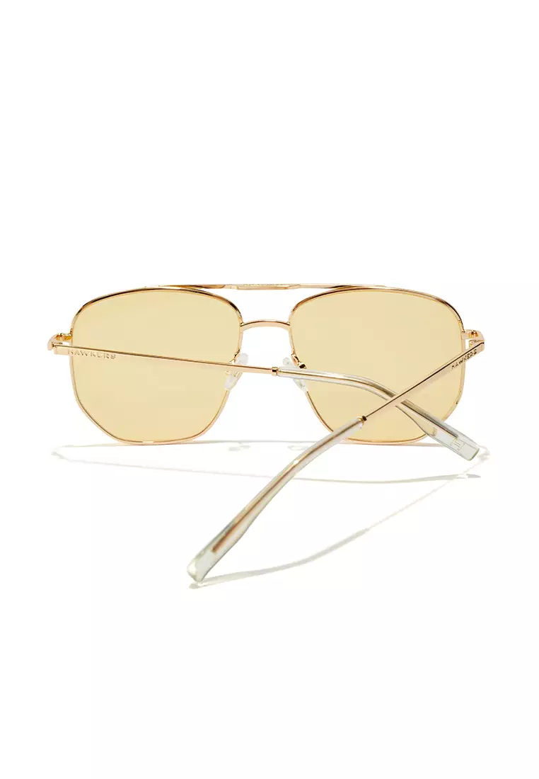 HAWKERS Gold Yellow CAD Sunglasses for Men and Women, Unisex. UV400 Protection. Official Product designed in Spain