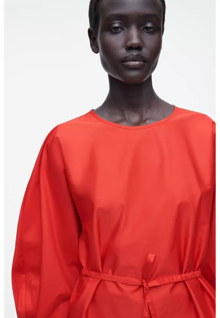 DRAWSTRING PEPLUM BLOUSE