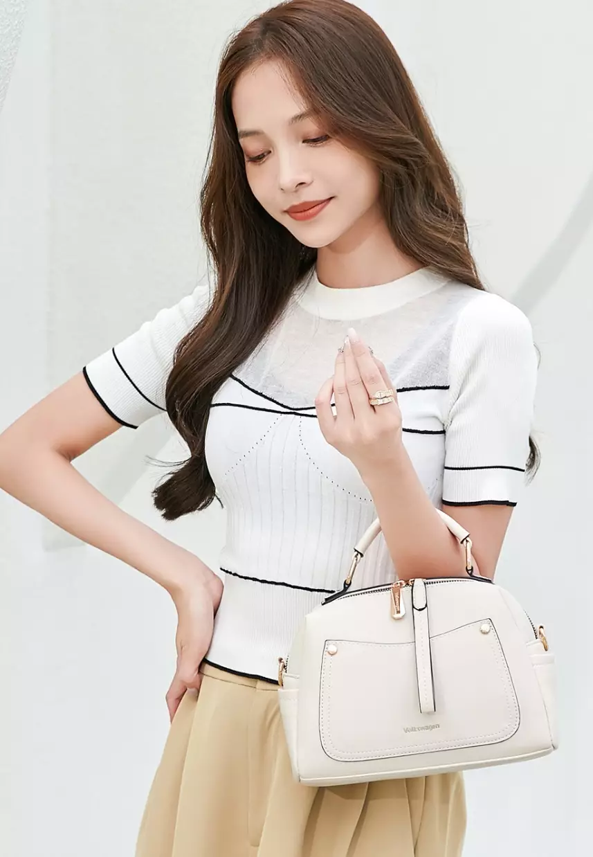 Sling bag shop with handle