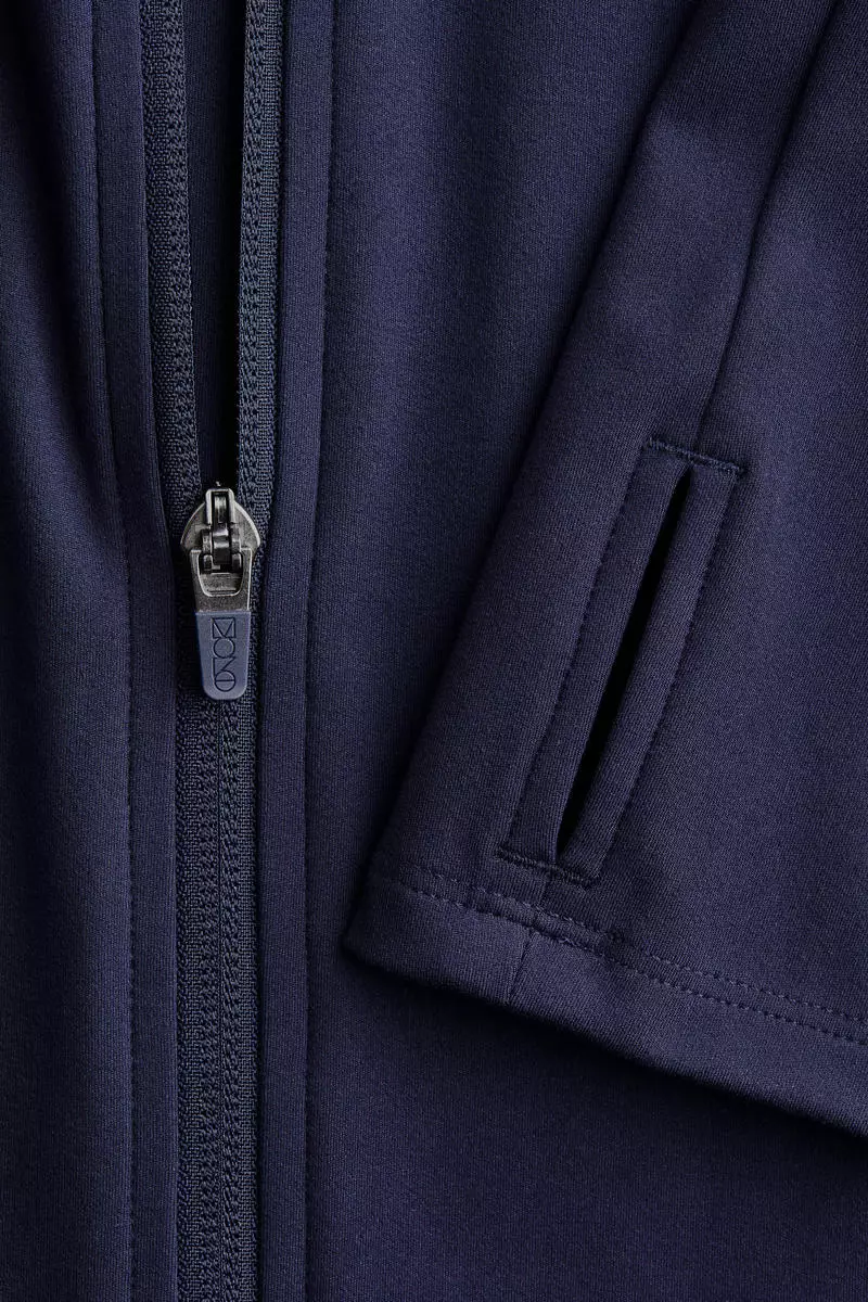 Zip-through sports jacket with SoftMove™