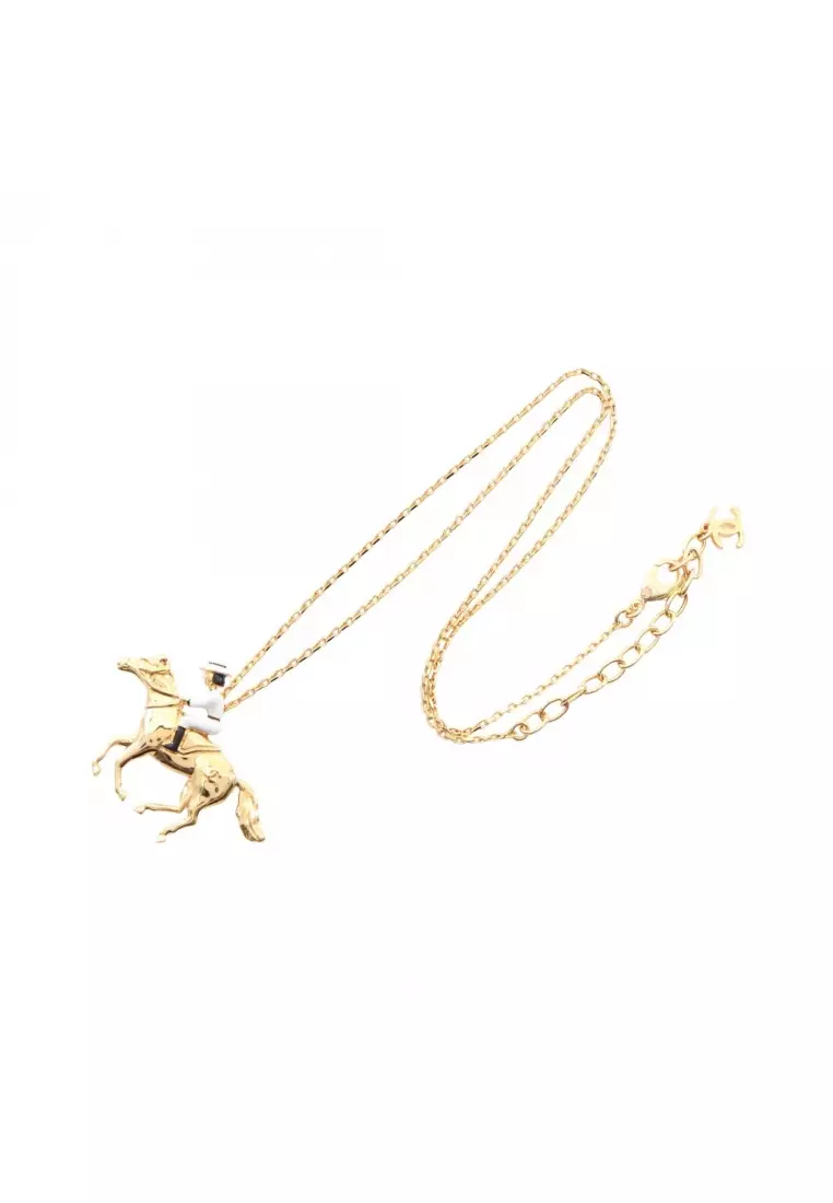 Pre-Loved Chanel coco mark horse riding necklace GP gold white black L26P