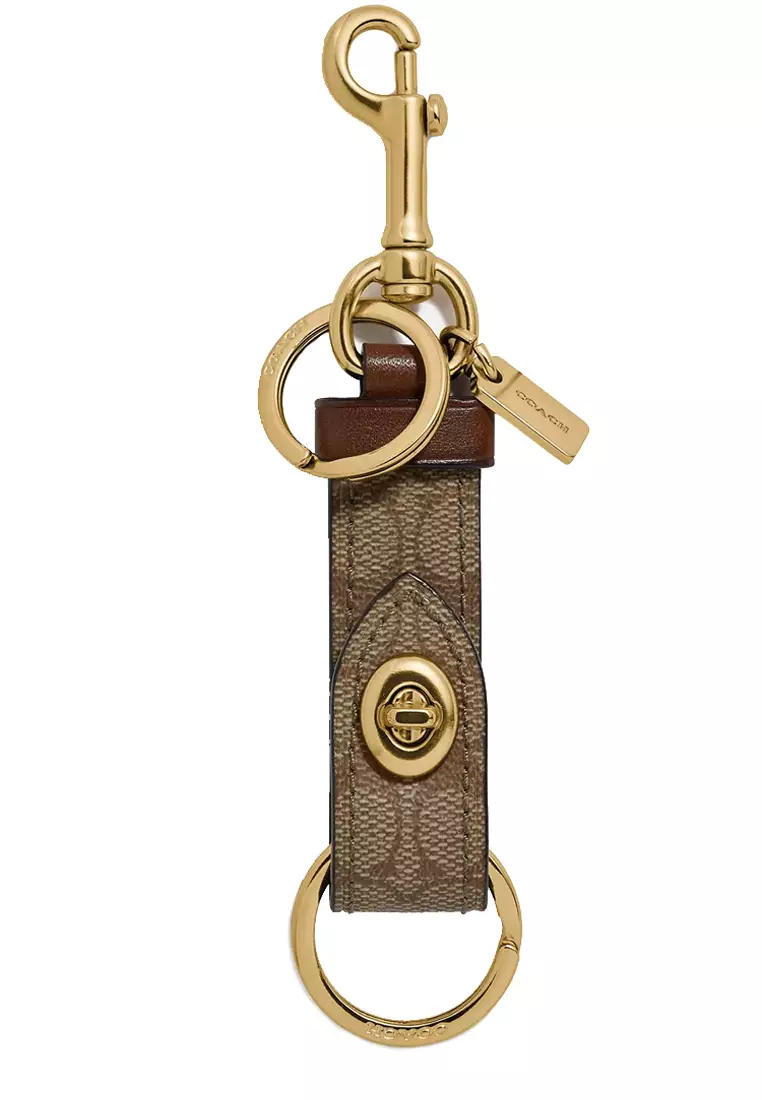 Coach Coach Trigger Snap Bag Charm In Signature Canvas in Khaki 49314