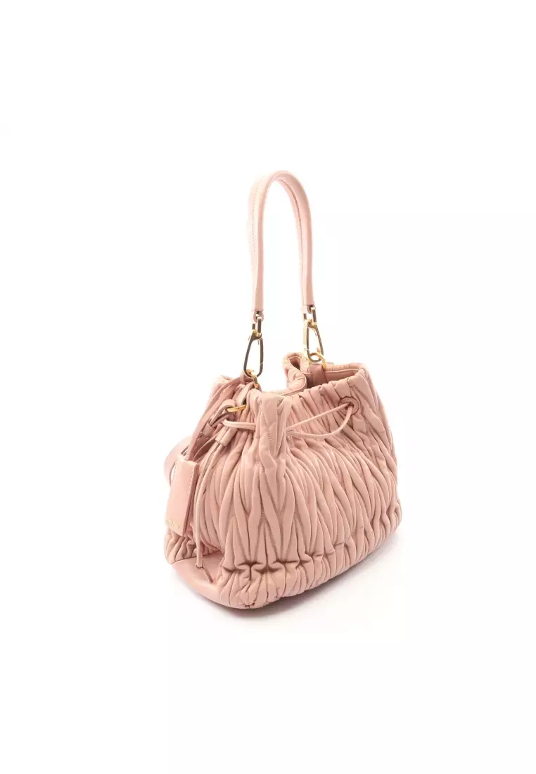 Pre-Loved MIU MIU matelasse 2WAY Handbag leather pink beige
