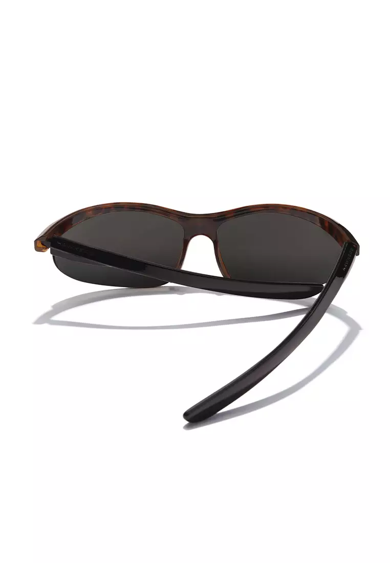 HAWKERS Vintage Carey Dark Grey Radiante Sunglasses For Men And Women, Unisex. Official Product Designed In Spain