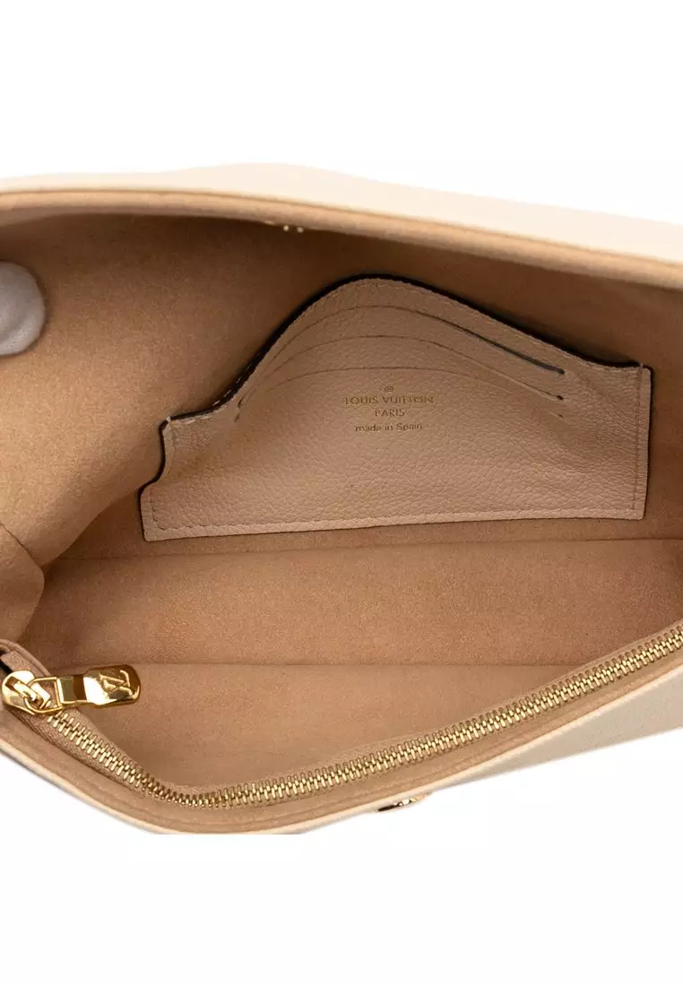 Pre-Loved Louis Vuitton Monogram Empreinte Giant Ivy Wallet On Chain