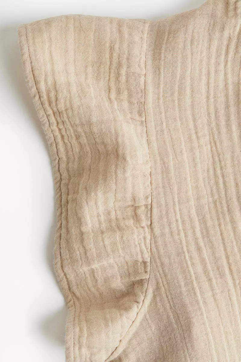 Flutter-sleeved muslin blouse