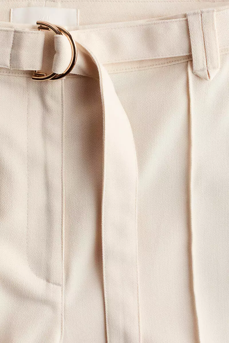 Flared belted trousers