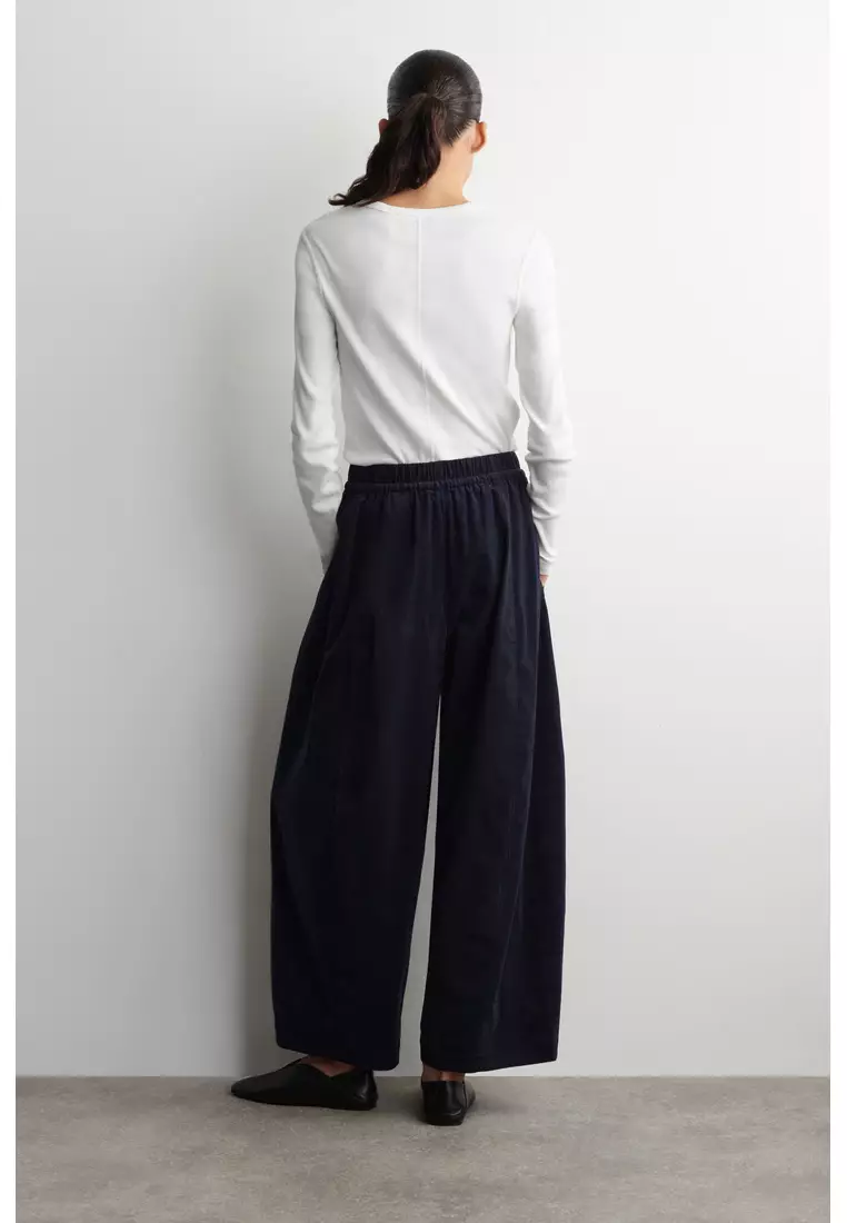 ELASTICATED CORDUROY BARREL-LEG TROUSERS