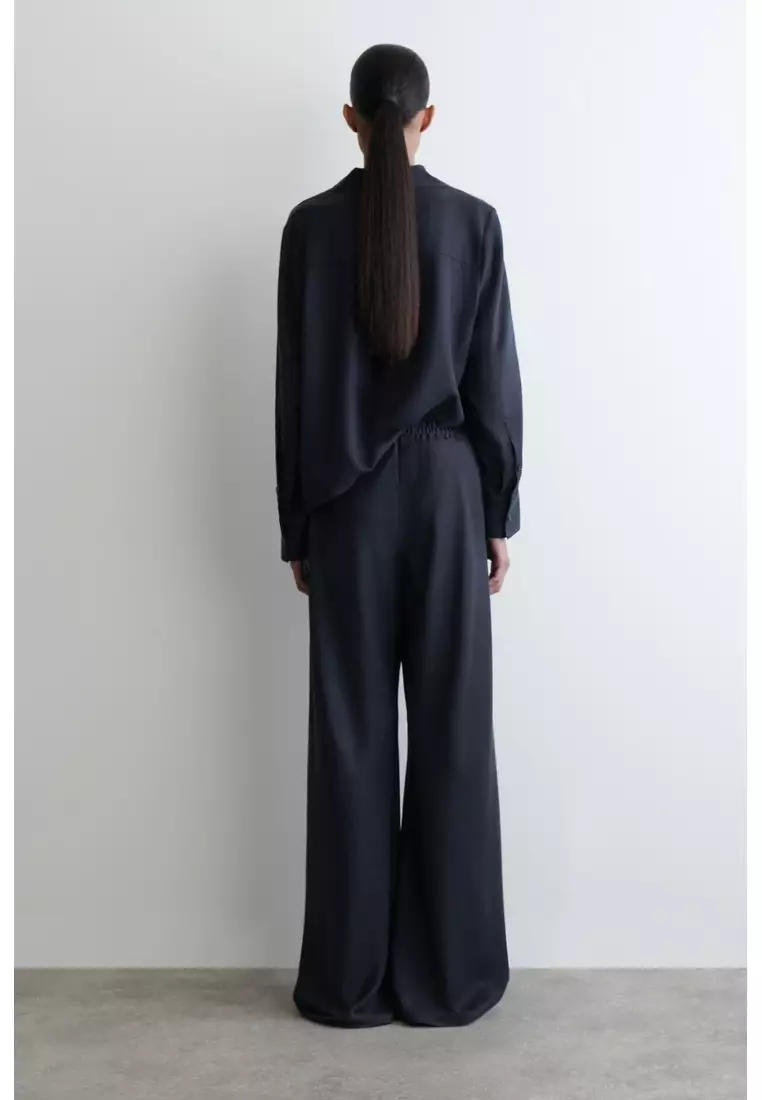ELASTICATED WIDE-LEG TROUSERS