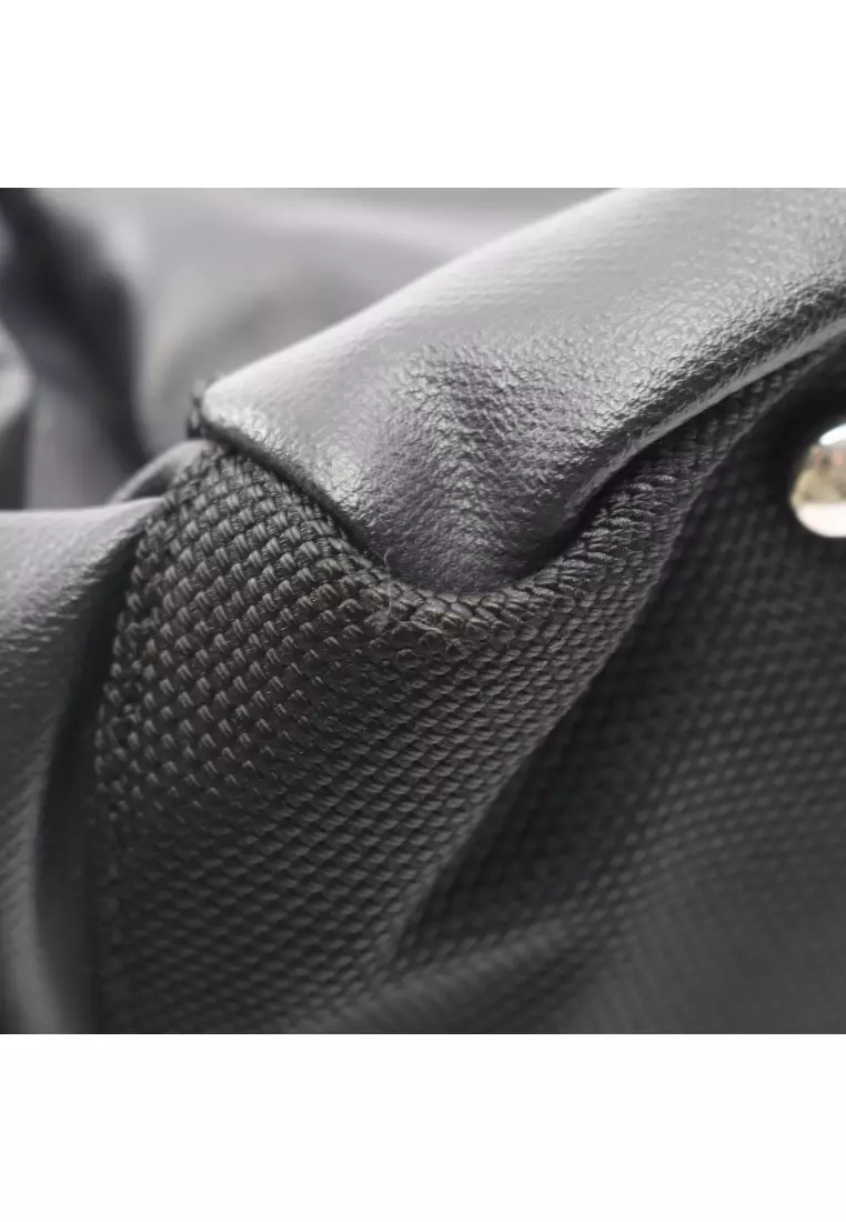 Pre-Loved Chanel Paris Biarritz GM Handbag tote bag Coated canvas leather black silver hardware