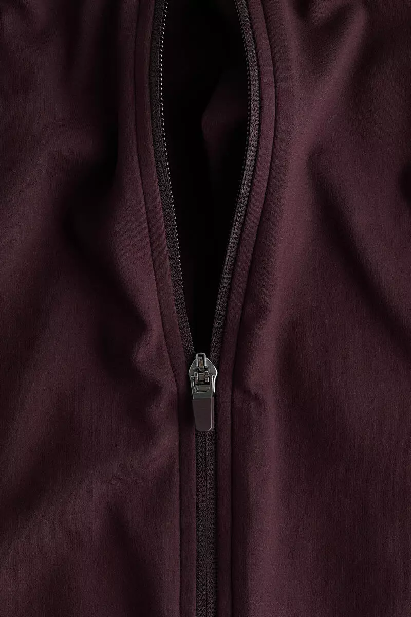 Zip-through sports jacket with SoftMove™