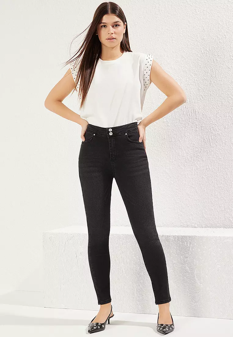 鈕扣細節高腰窄腳牛仔褲