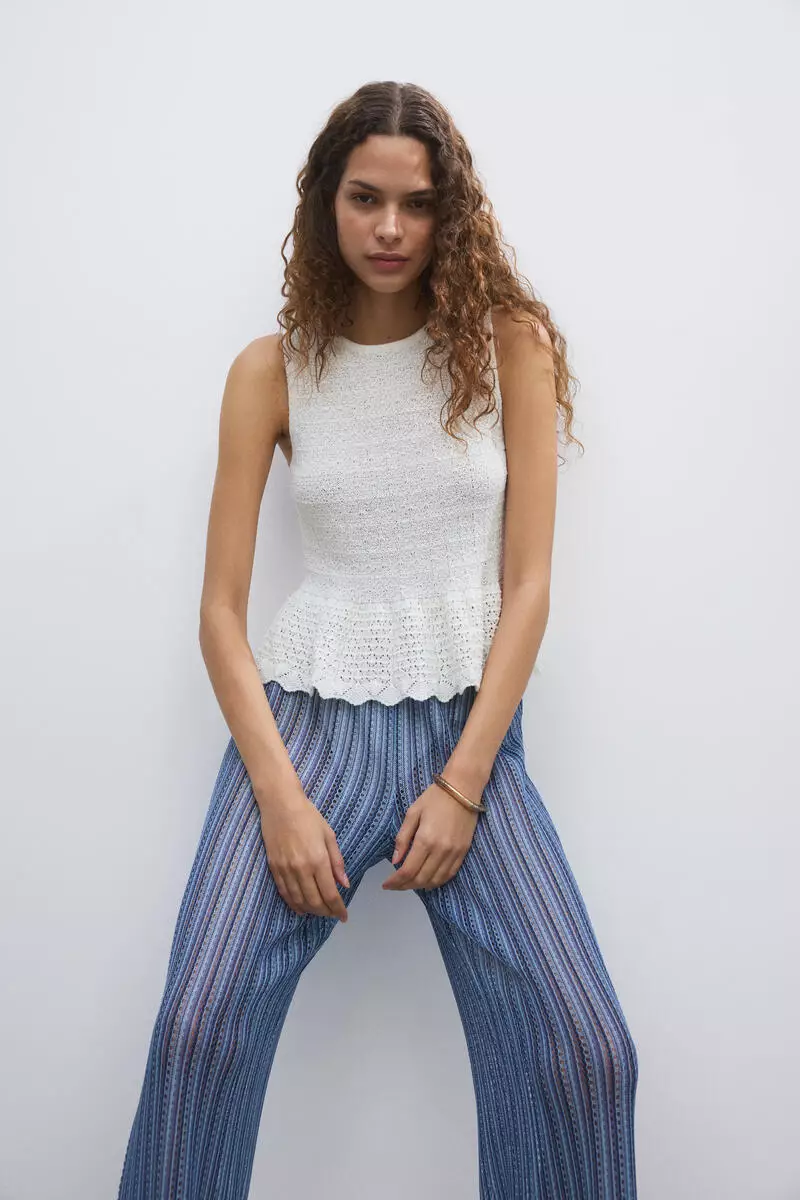 Wide hole-knit trousers