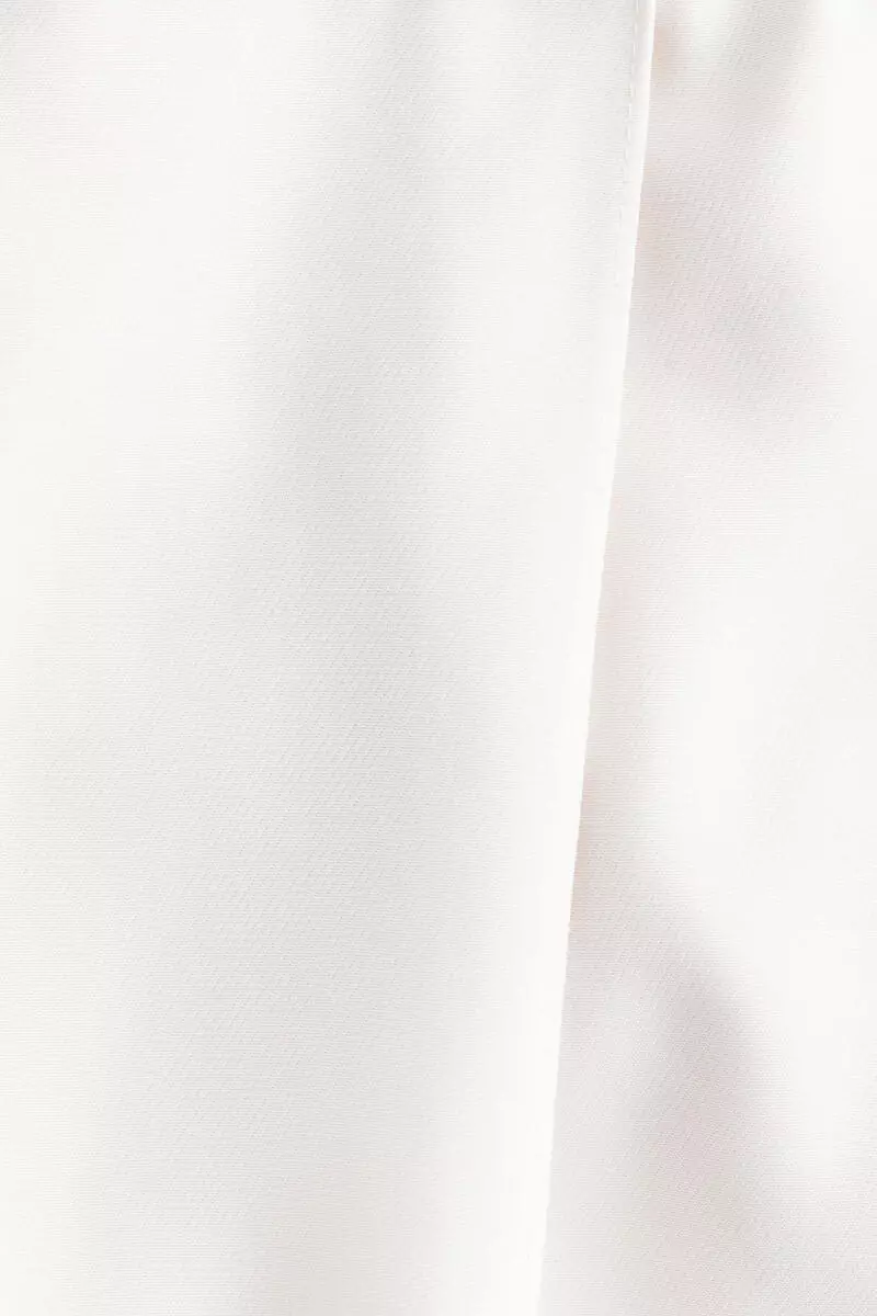 Crease-leg barrel trousers