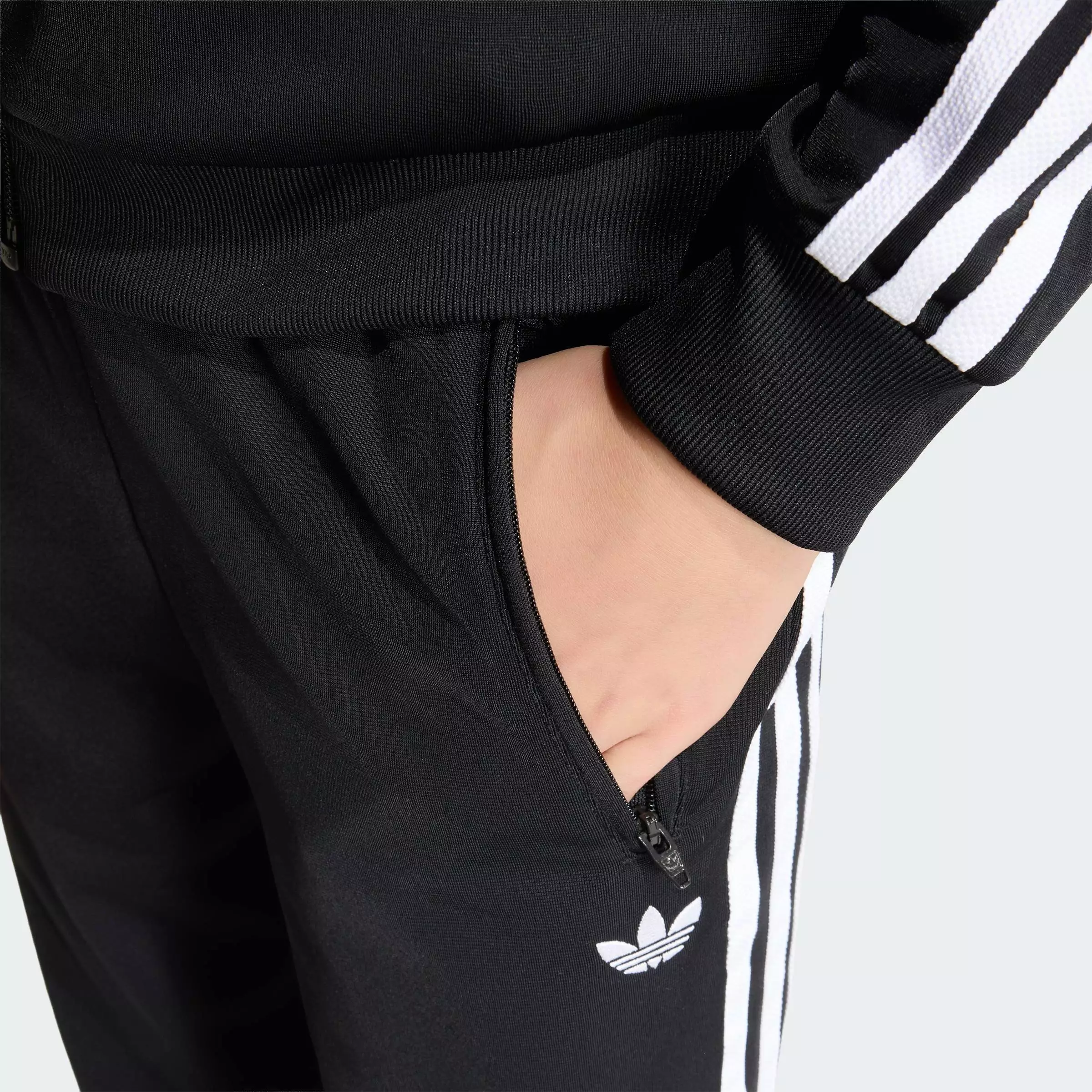 Lifestyle DISNEY FIREBIRD TRACKPANTS Unisex Black KC8441