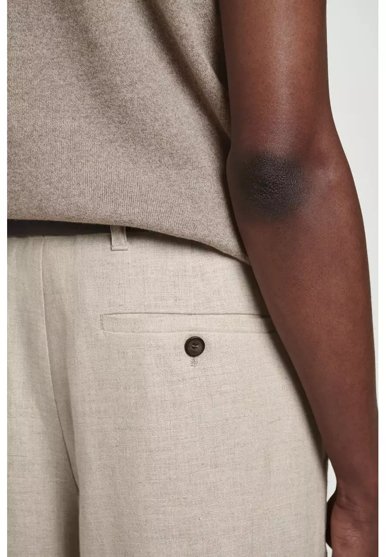 RELAXED LINEN TAPERED TROUSERS